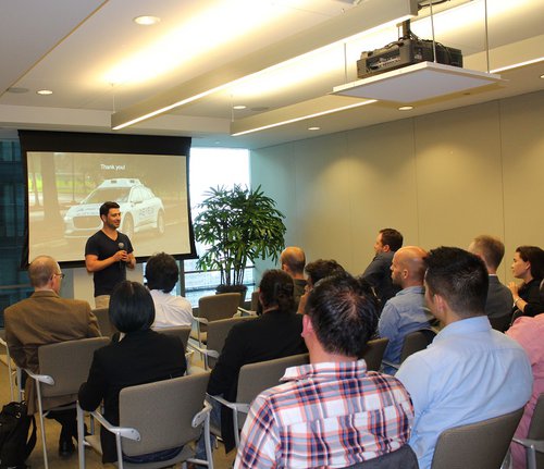 Greene speaking at the Berkeley Haas Transportation & Mobility Group Summer Social in downtown San Francisco